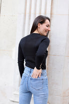 Pull noir femme à boutons dorés – Élégance chic & confort stretch