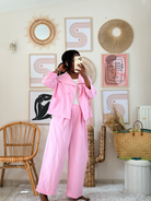 Ensemble rose veste courte et pantalon ample