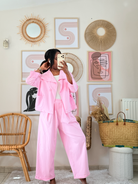 Ensemble rose veste courte et pantalon ample