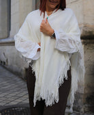 Poncho blanc à franges 