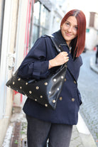 Sac à Main Triangle Noir avec Clous Dorés