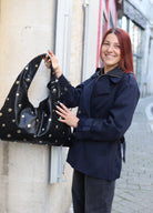 Sac à Main Triangle Noir avec Clous Dorés